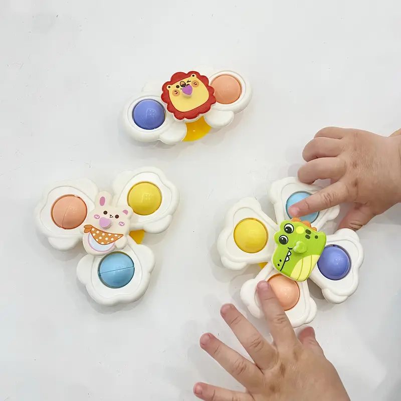 Set of 3 cartoon animal suction cup spinning tops for babies